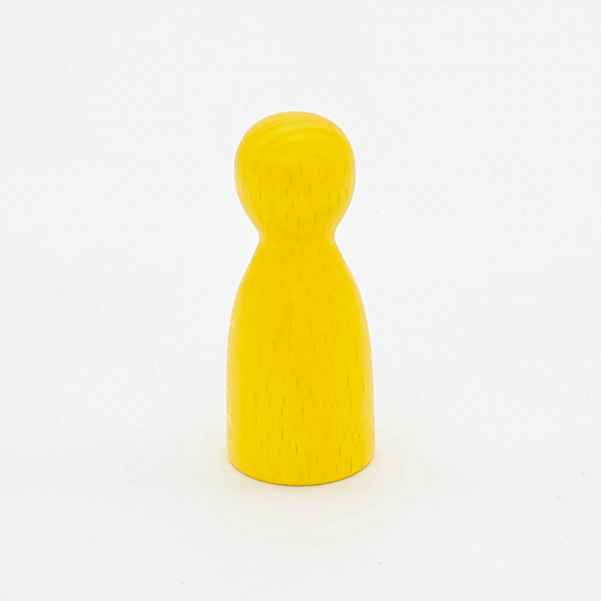 Spielfiguren aus Holz in gelb