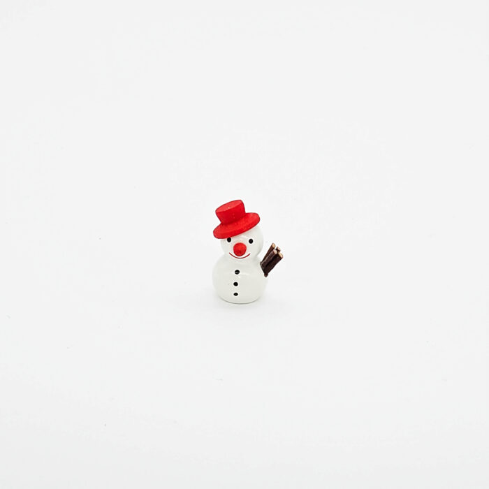 kleine weiße Schneemänner mit rotem Hut